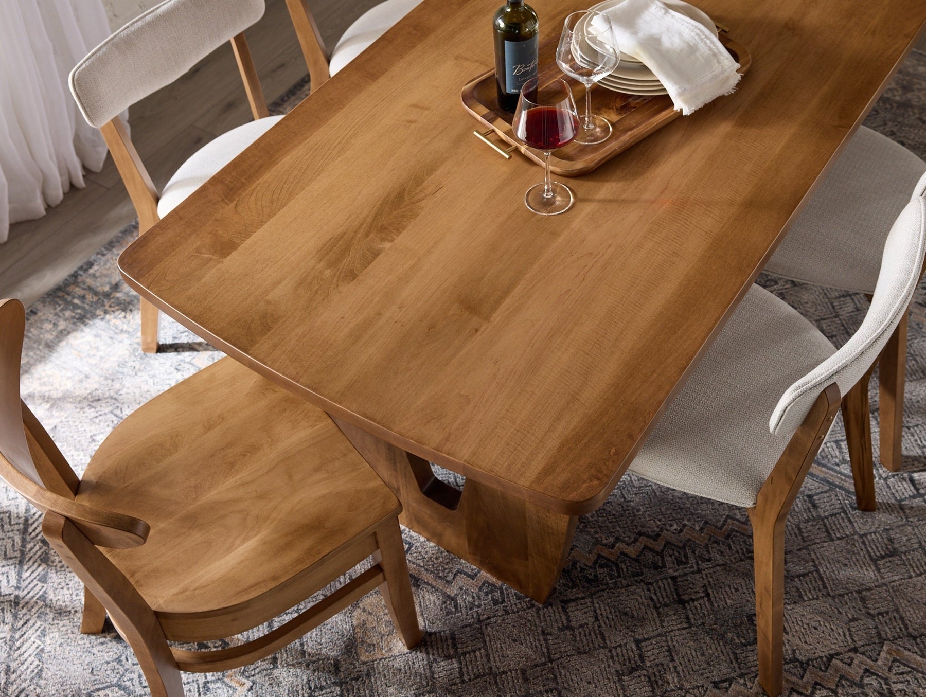 Close-up of a real wood furniture top showing natural grain at Barewood in Clearwater, FL