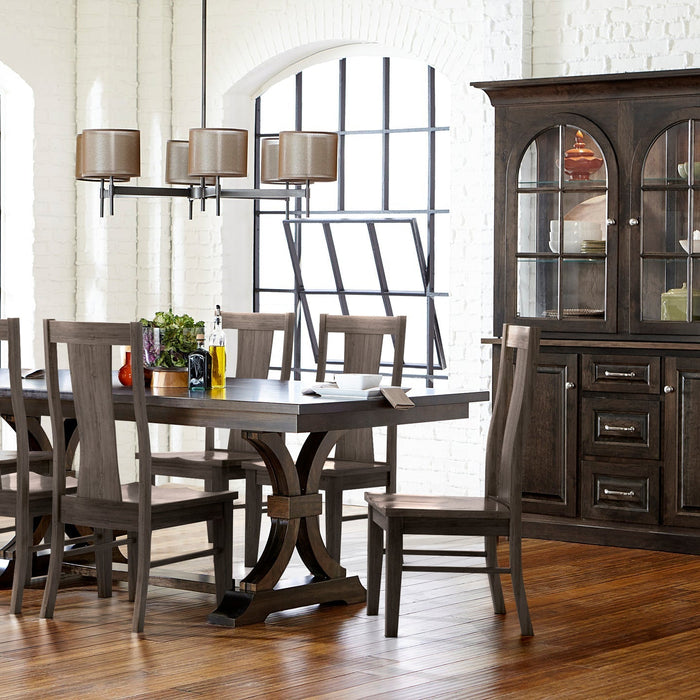 A Fusion custom dining set in a dark stained finish, with a trestle table on a curved double-pedestal base, six tall-back side chairs, and a matching hutch with arched glass doors