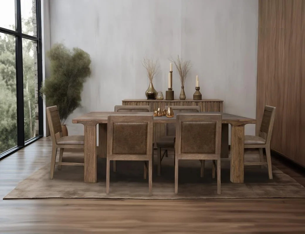 Mezquite dining table and chairs in solid mango wood, styled in a dining room