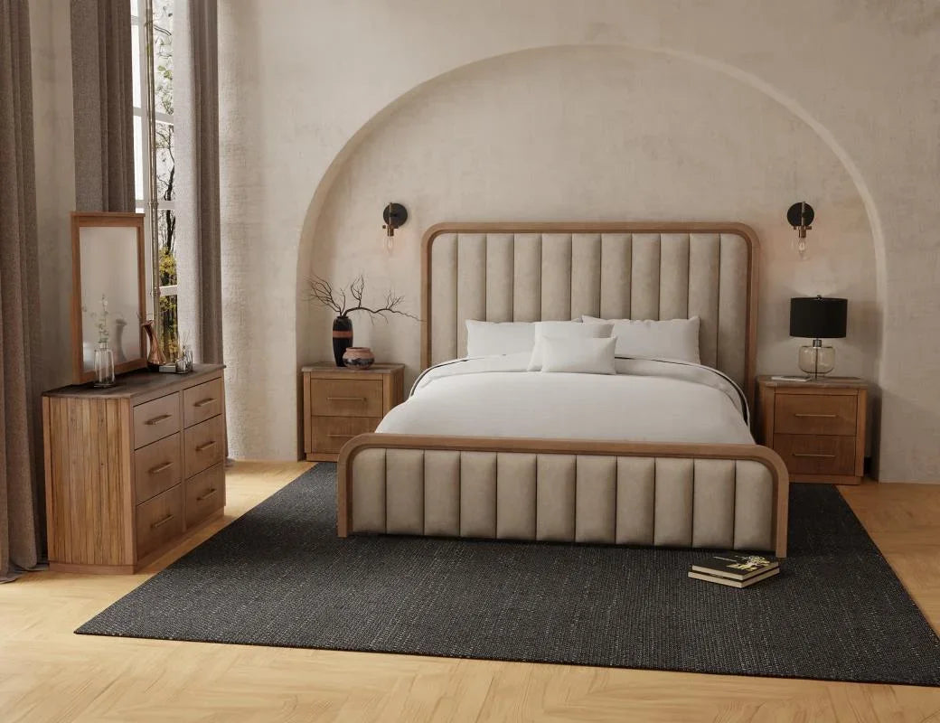 Mezquite Upholstered Collection — channel-tufted upholstered bed and warm brown mango wood case pieces in a styled bedroom