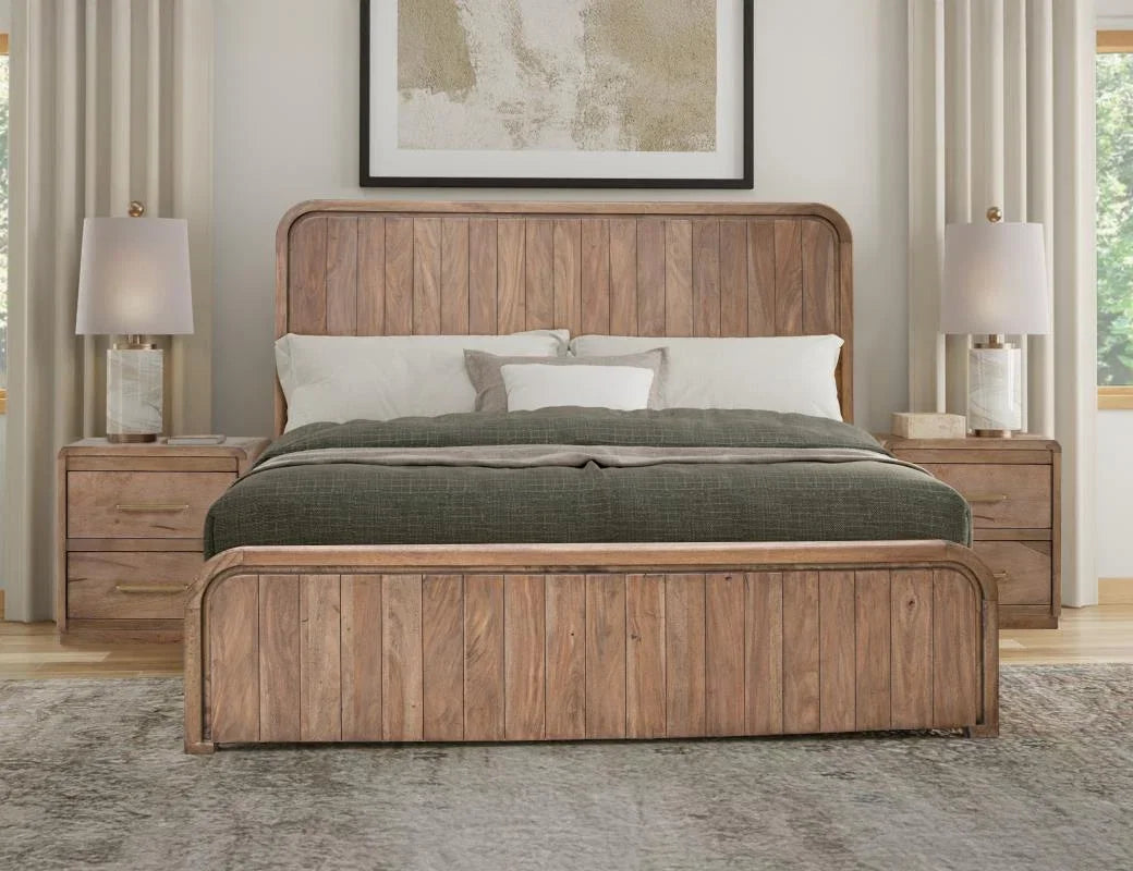 Mezquite collection — solid mango wood panel bed and nightstands in a light distressed brown finish in a styled bedroom