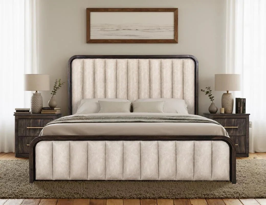 Dark Mezquite upholstered bed and black case pieces in a styled bedroom
