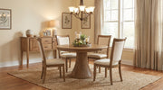 Fluted Pedestal Dining Table with Ellis side chairs in a dining room - Barewood