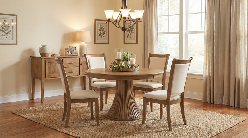 Fluted Pedestal Dining Table with Ellis side chairs in a dining room - Barewood
