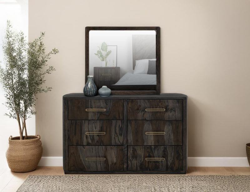Balam Black Dresser styled in a bedroom