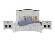 Pueblo White bed flanked by two nightstands