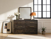 Dark Mezquite Panel Mirror above the matching dresser