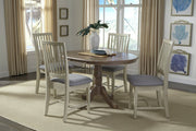 Mission Chairs in a painted finish with cushioned seats at the 36" Round Extension Bistro Table - Barewood
