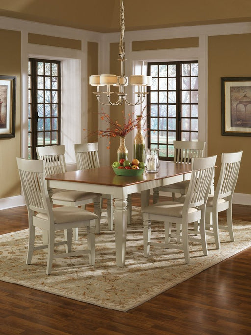 Seattle Chairs custom finished in cream at the Java Dining Table - Barewood