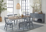 Buoy oval dining table with Zealand chairs and the Emma Server in Smoke - Barewood